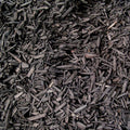 Black colored shredded mulch