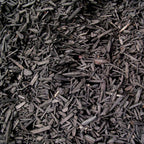 Black colored shredded mulch