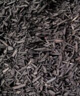 Black colored shredded mulch